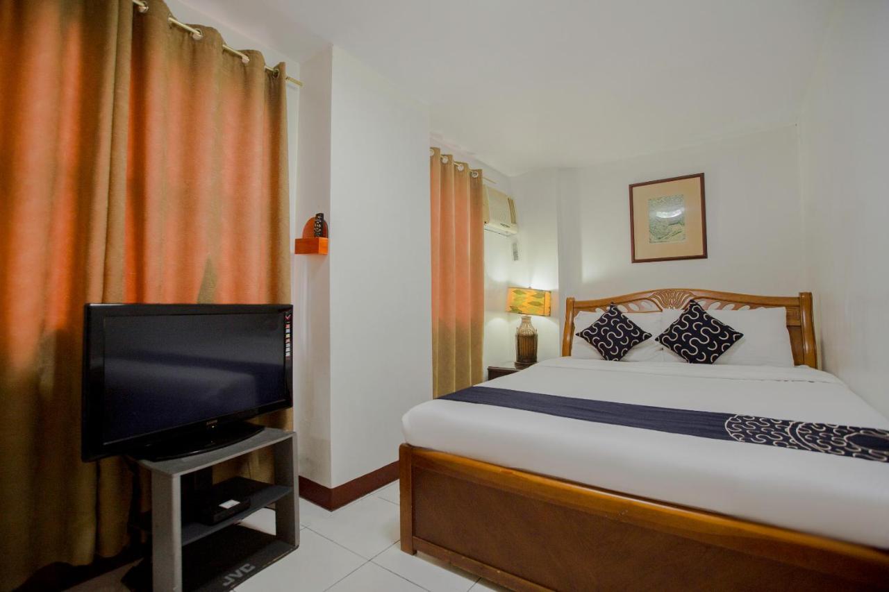 Capital O 201 Newgrange Condotel Cidade Quezon Exterior foto