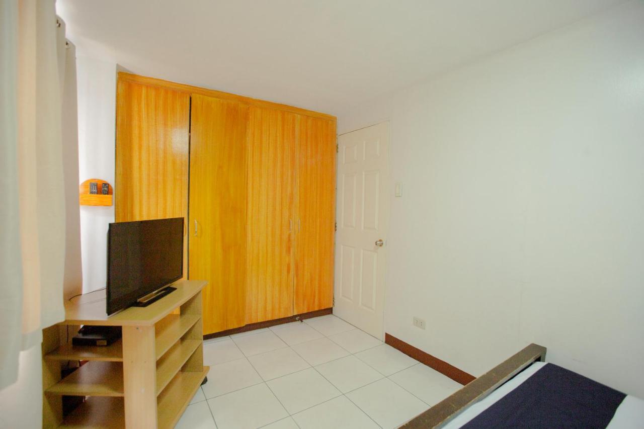 Capital O 201 Newgrange Condotel Cidade Quezon Exterior foto