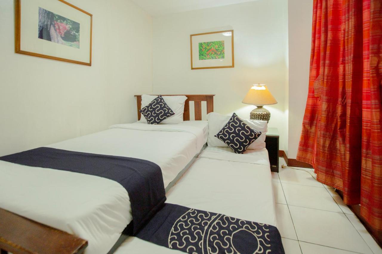 Capital O 201 Newgrange Condotel Cidade Quezon Exterior foto